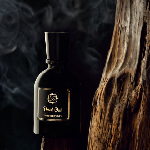 Desert Oud arabian perfume in front of oud and with smoke